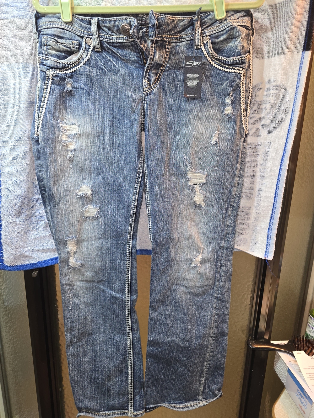 Women's Distressed Light Blue Boyfriend Jeans with Rope Trim